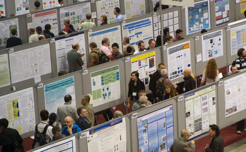 A picture of a large poster session at a conference.